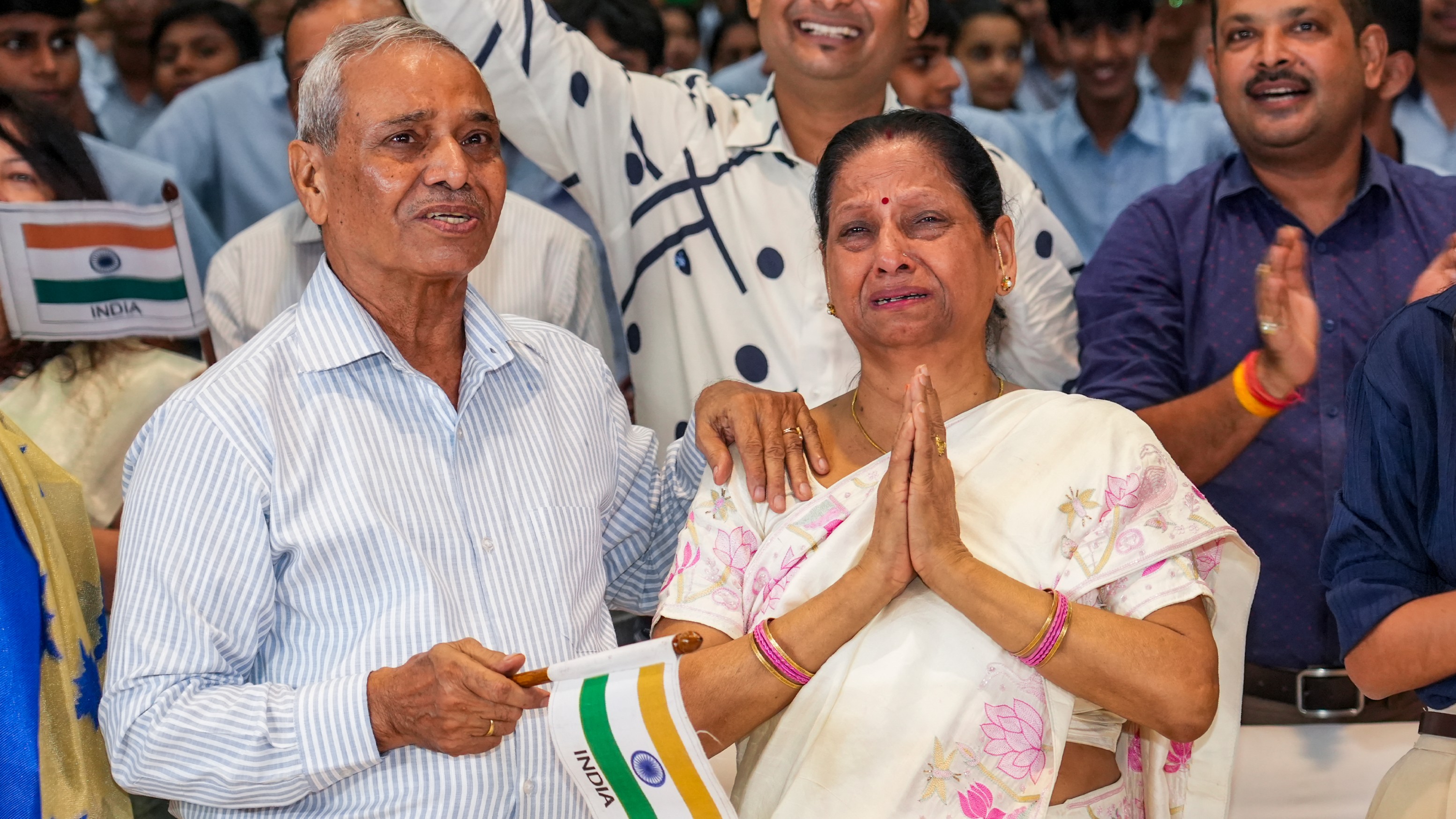 Shukla’s parents, Shambhu Dayal Shukla and Asha Devi, were seen wiping their tears overwhelmed with emotion at his safe landing.