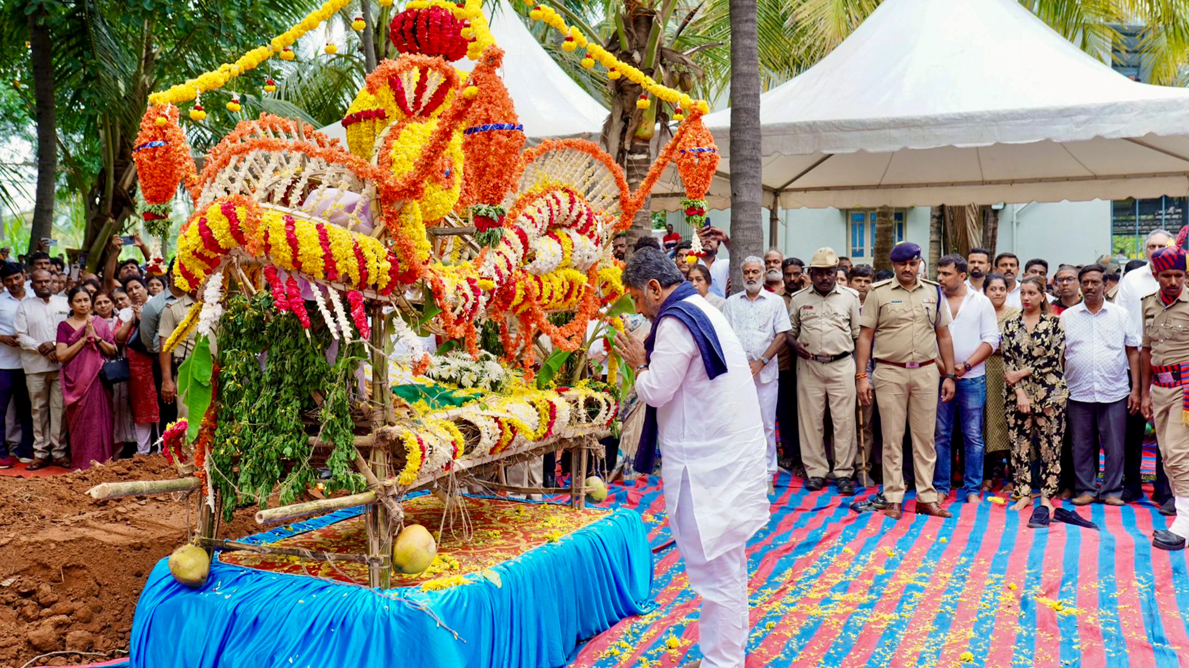 Karnataka Deputy Chief Minister DK Shivakumar pays tribute during the funeral of B Saroja Devi in her native village of Dashavara.