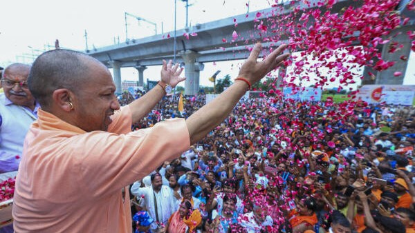 'Miscreants infiltrate Kanwariyas': Yogi threatens action on those trying to 'defame' them, showers flowers 
