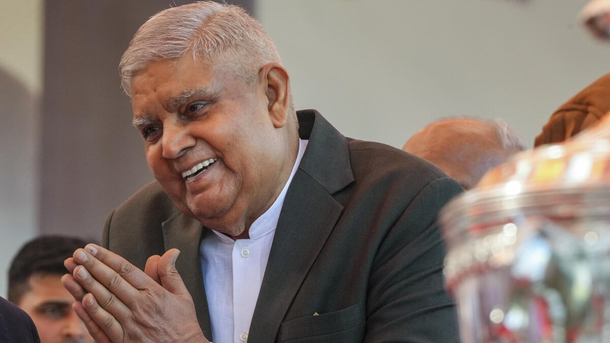 Former vice president Jagdeep Dhankhar greets his successor C P  Radhakrishnan