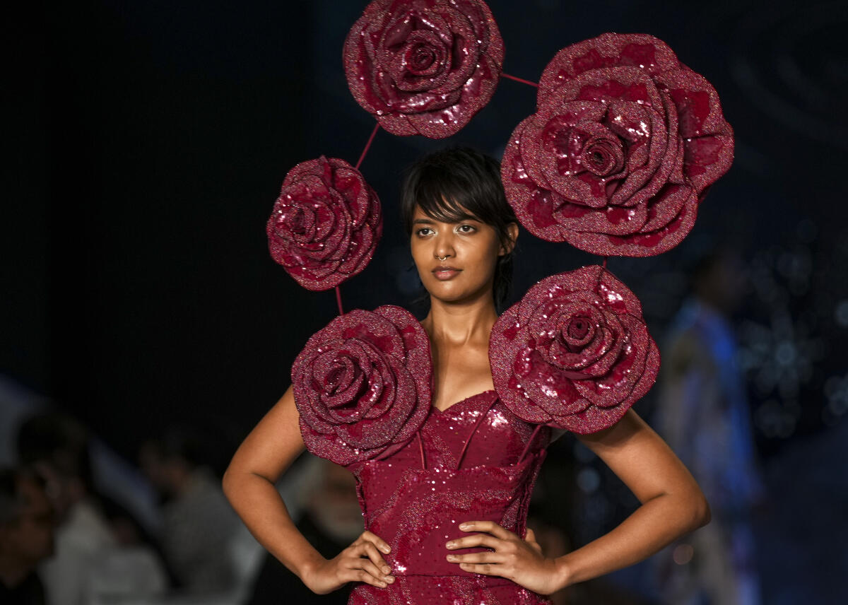 A model walks the ramp wearing a creation by designer Rahul Mishra during the ‘FDCI India Couture Week’, in New Delhi.
