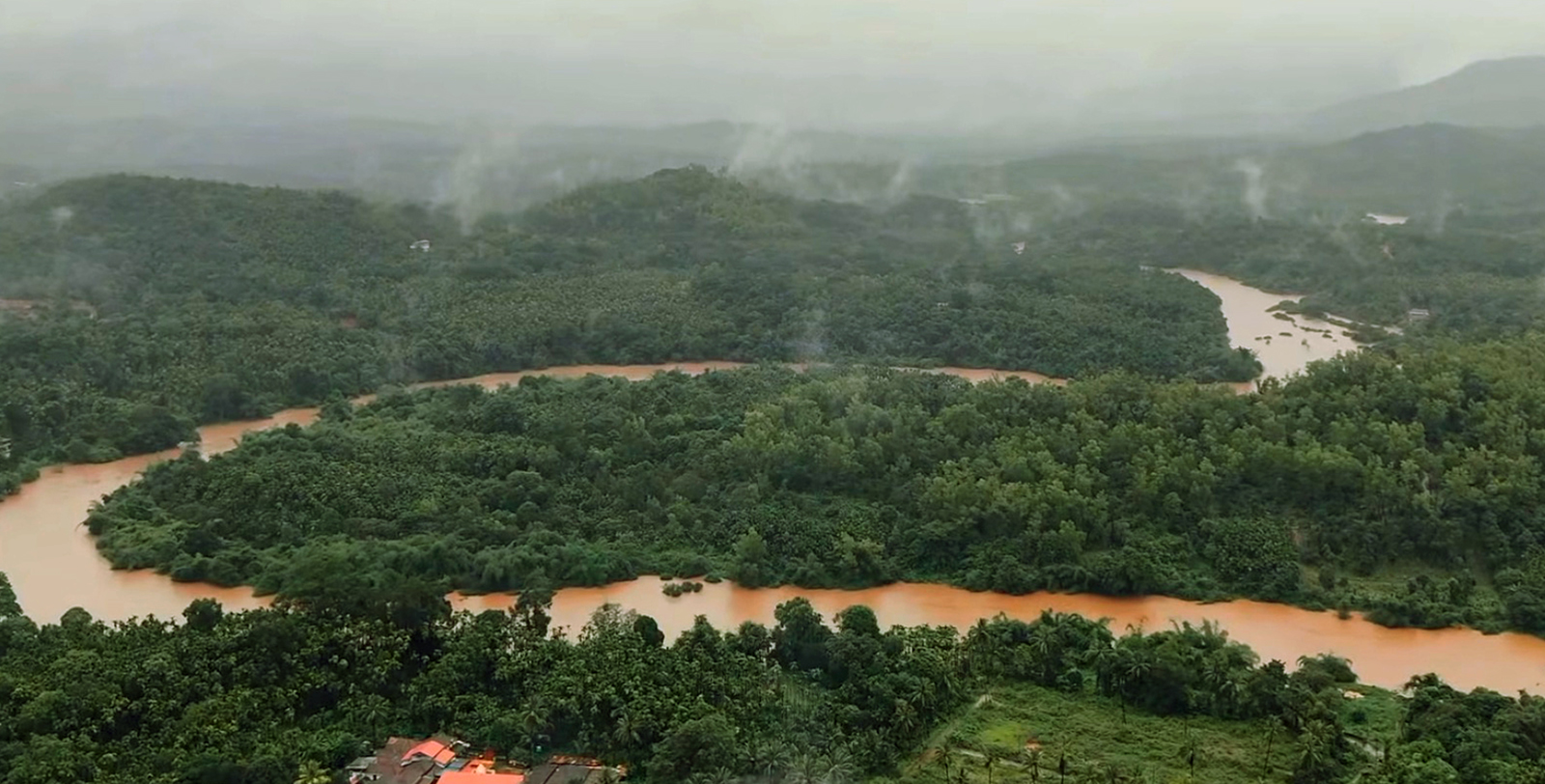 The swollen Tunga river meanders its way through the forest near Sringeri in Chikkamagaluru district.
