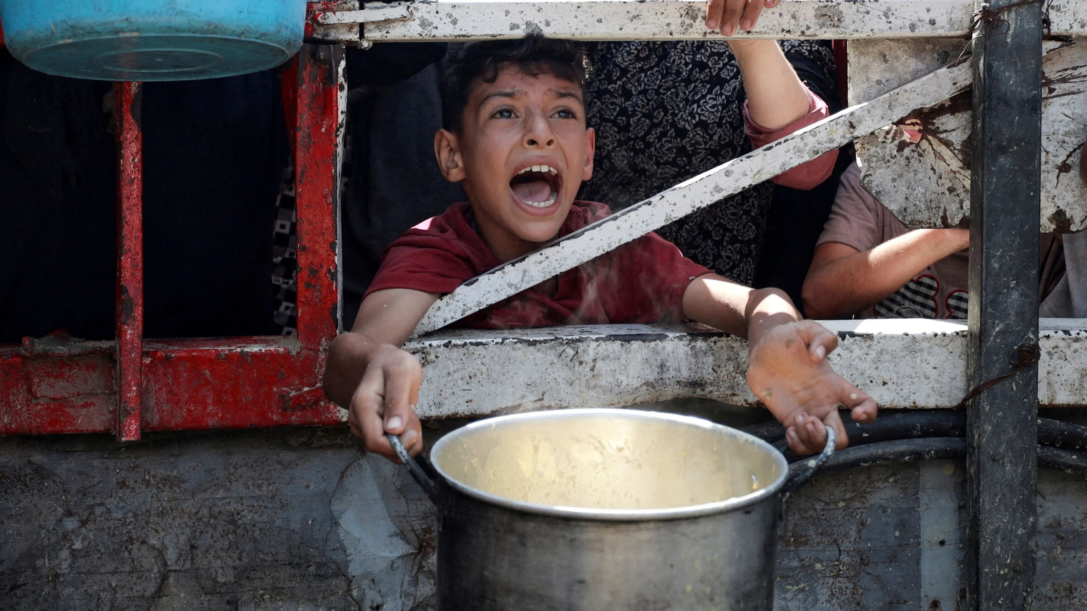 Famine is 'playing out' in Gaza, warns global hunger monitor 