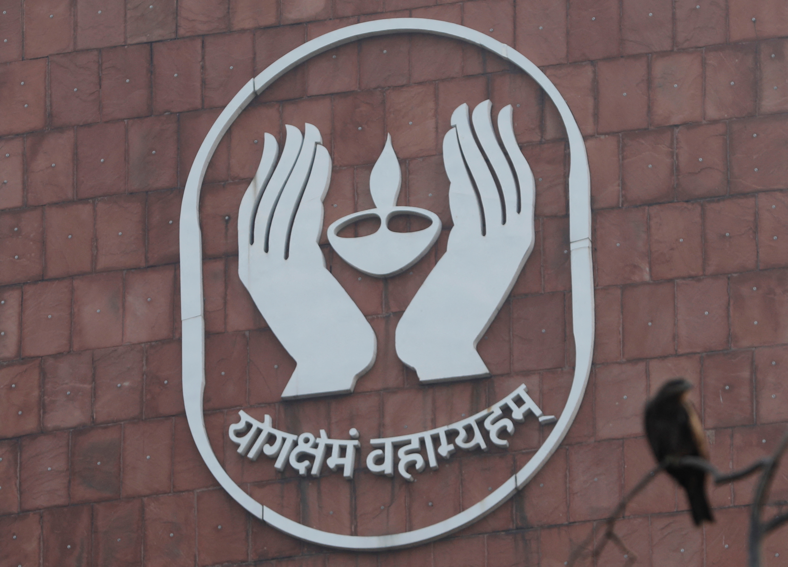 A logo of Life Insurance Corporation of India (LIC) is pictured at one of its offices in New Delhi India January 24 2022. Picture taken on January 24 2022. REUTERS/Adnan Abidi