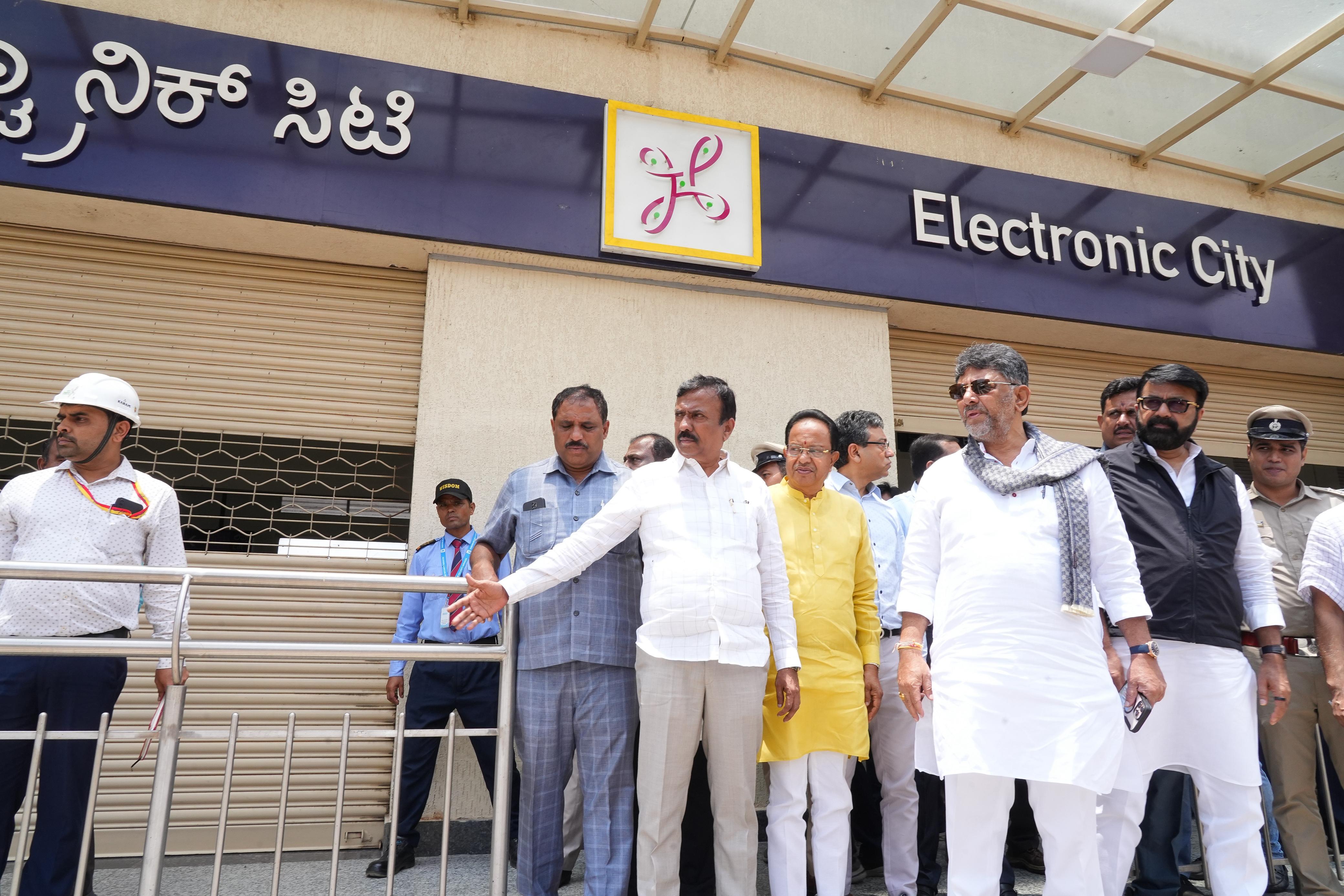 Deputy Chief Minister DK Shivakumar and local MLAs at the Electronics City metro station. 