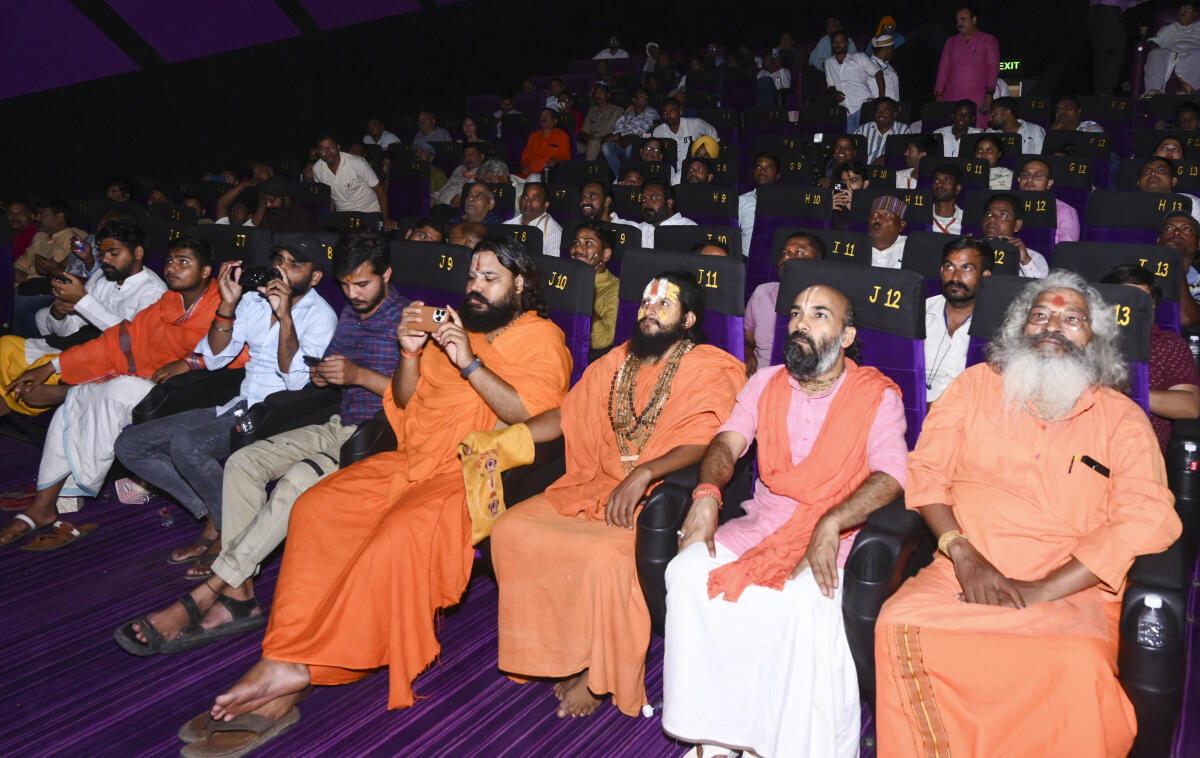 Priests and others watch the film '695' during a screening in Ayodhya, Tuesday, Aug. 5, 2025. The film tells the story of the 500-year struggle for the Ram Mandir.