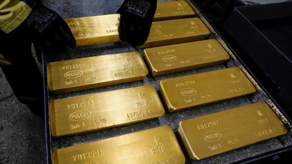 Gold hits record high of Rs 1,03,420 as US tariffs roil markets