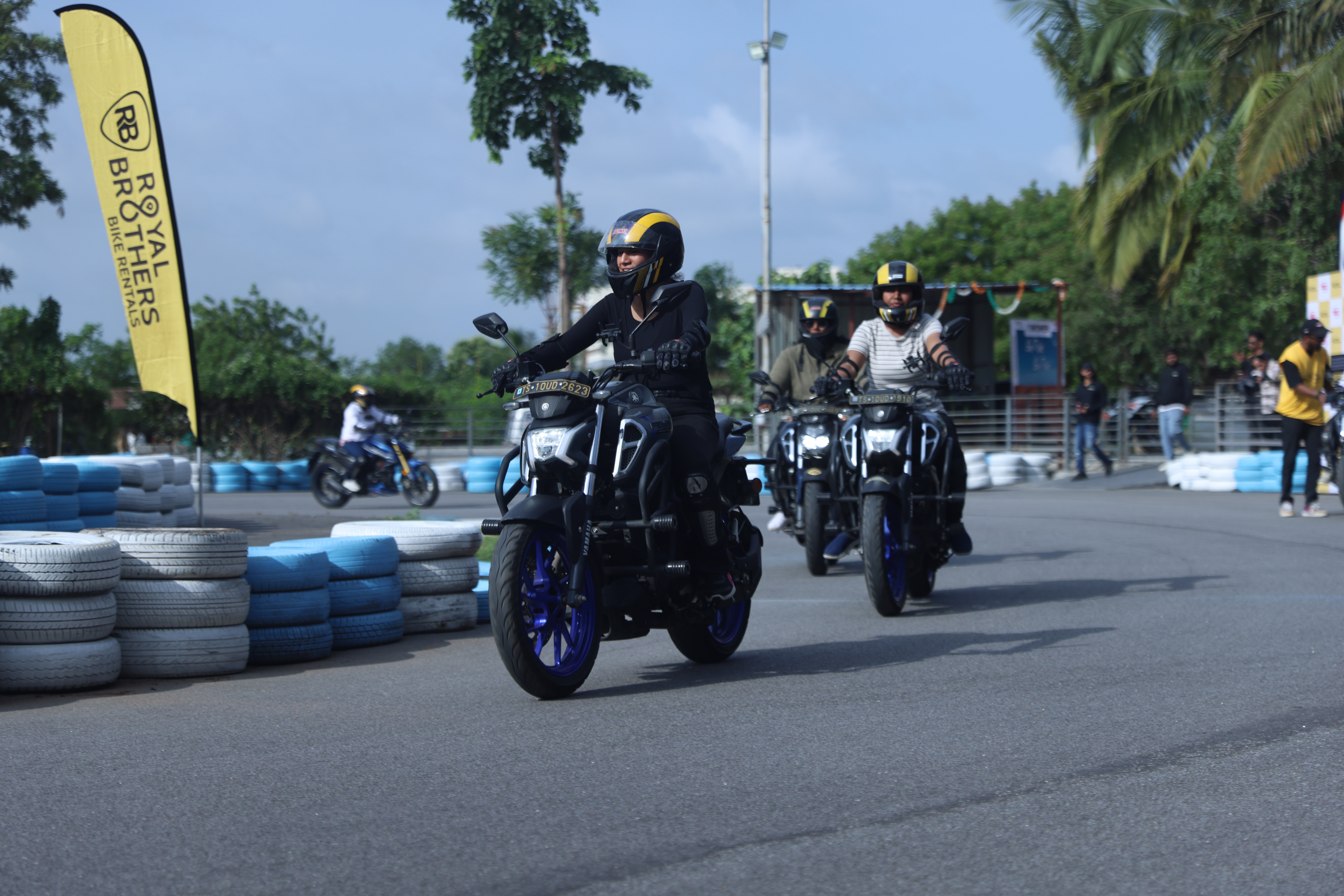 Women learning to ride bikes at the #RBForWomen event organised by Royal Brothers