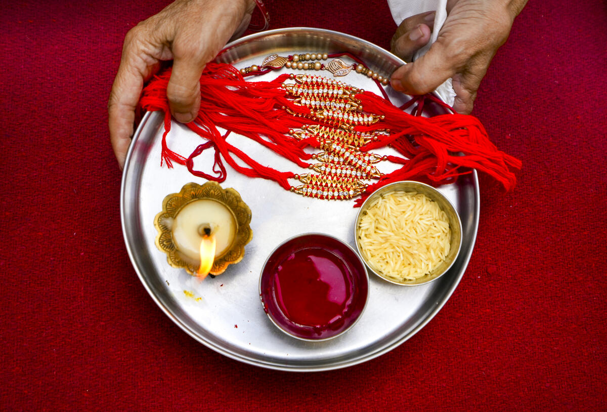 A platter of 'rakhis' and other items for rituals on the occasion of the ‘Raksha Bandhan’ festival, at the Attari-Wagah border, in Amritsar district, Punjab.