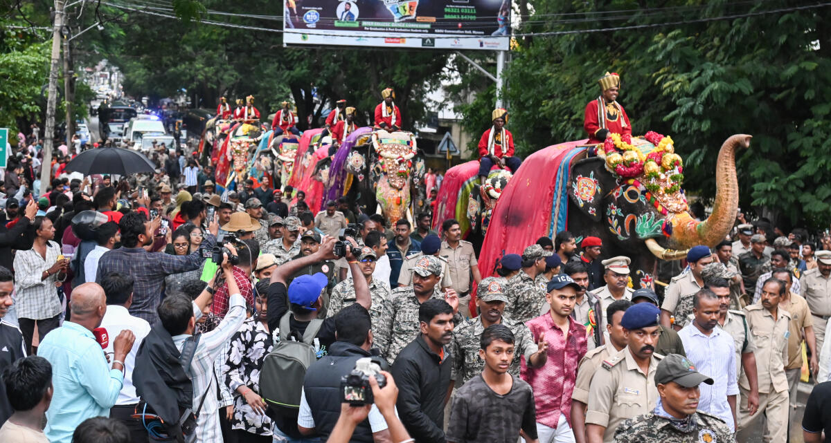 People enthralled to see Dasara elephants taken in procession from Aranya Bhavan to Mysuru Palace