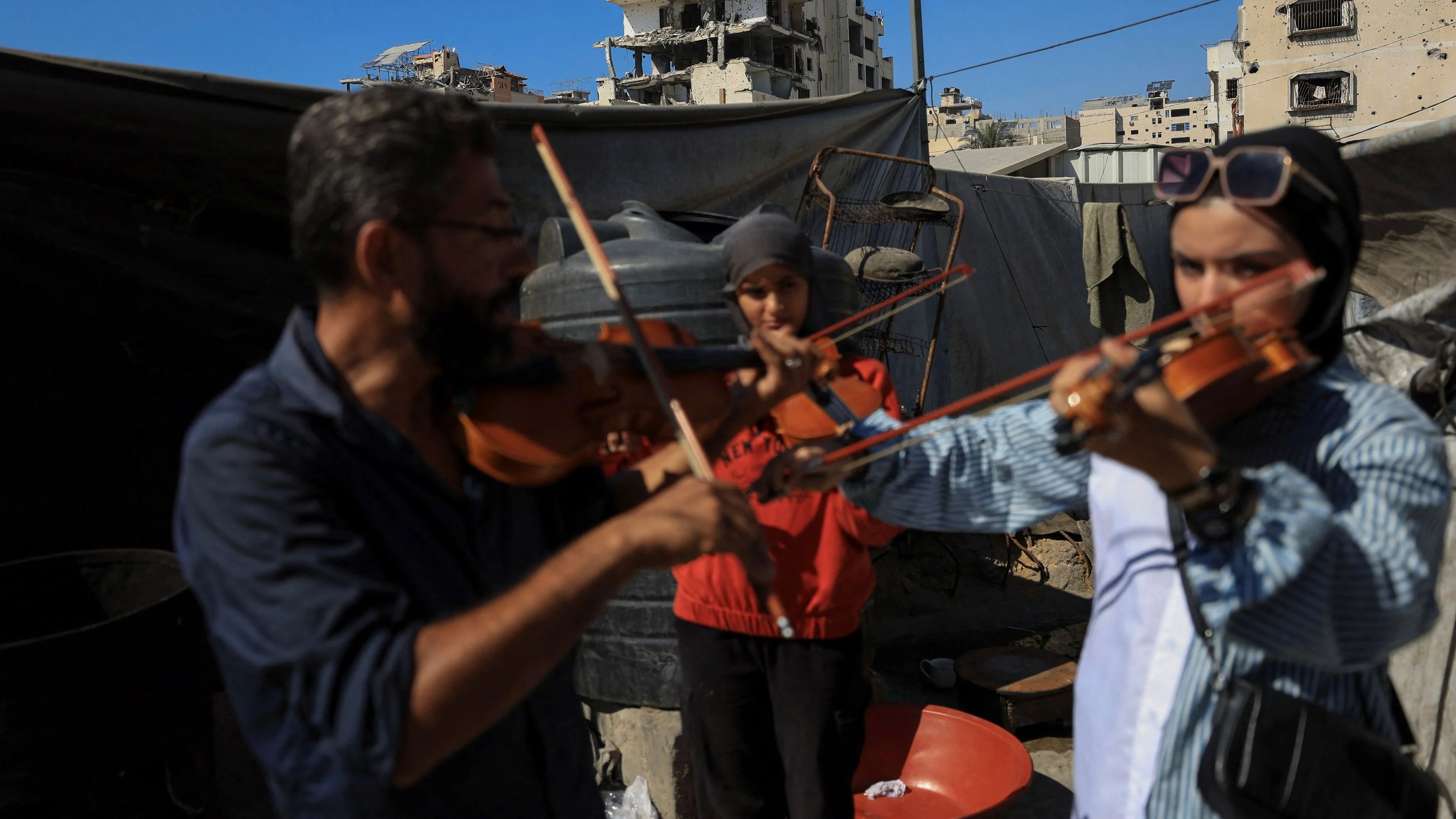 Gaza's young musicians sing and play in the ruins of war