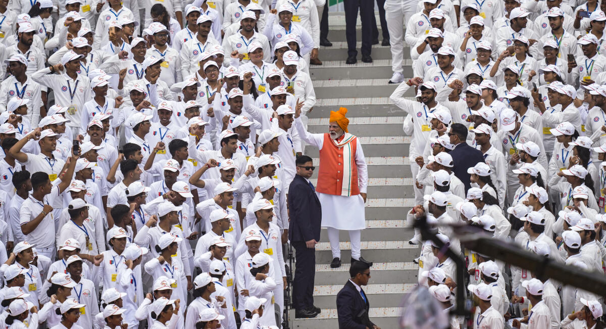 Prime Minister Narendra Modi interacts with NCC cadets during the 79th Independence Day celebration at the Red Fort, in New Delhi
