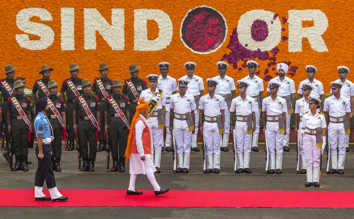 Prime Minister Narendra Modi inspects a Guard of Honour during the 79th Independence Day celebration at the Red Fort, in New Delhi