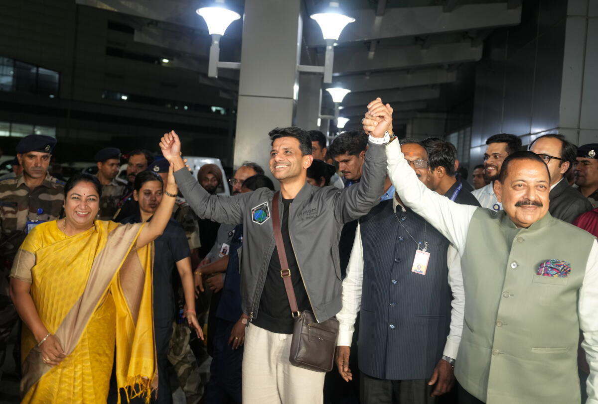 Delhi Chief Minister Rekha Gupta and Union Minister of Science and Technology Jitendra Singh receive Astronaut Shubhanshu Shukla upon his arrival at the Indira Gandhi International (IGI) Airport, in New Delhi, early Sunday, Aug. 17, 2025.