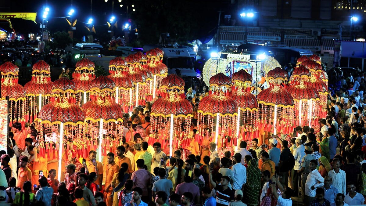 People take part in a traditional procession as part of Janmashtmi festival celebration, in Jaipur.