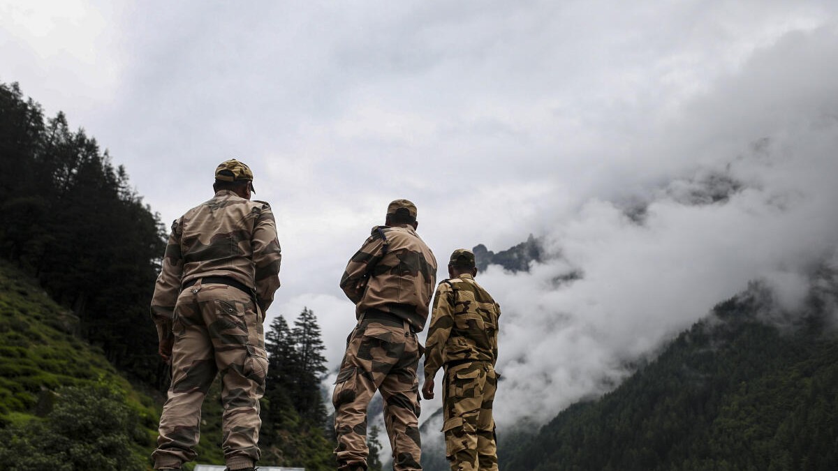 Security personnel during a search and rescue operation at cloudburst-hit Chisoti village, in Jammu and Kashmir’s Kishtwar district.