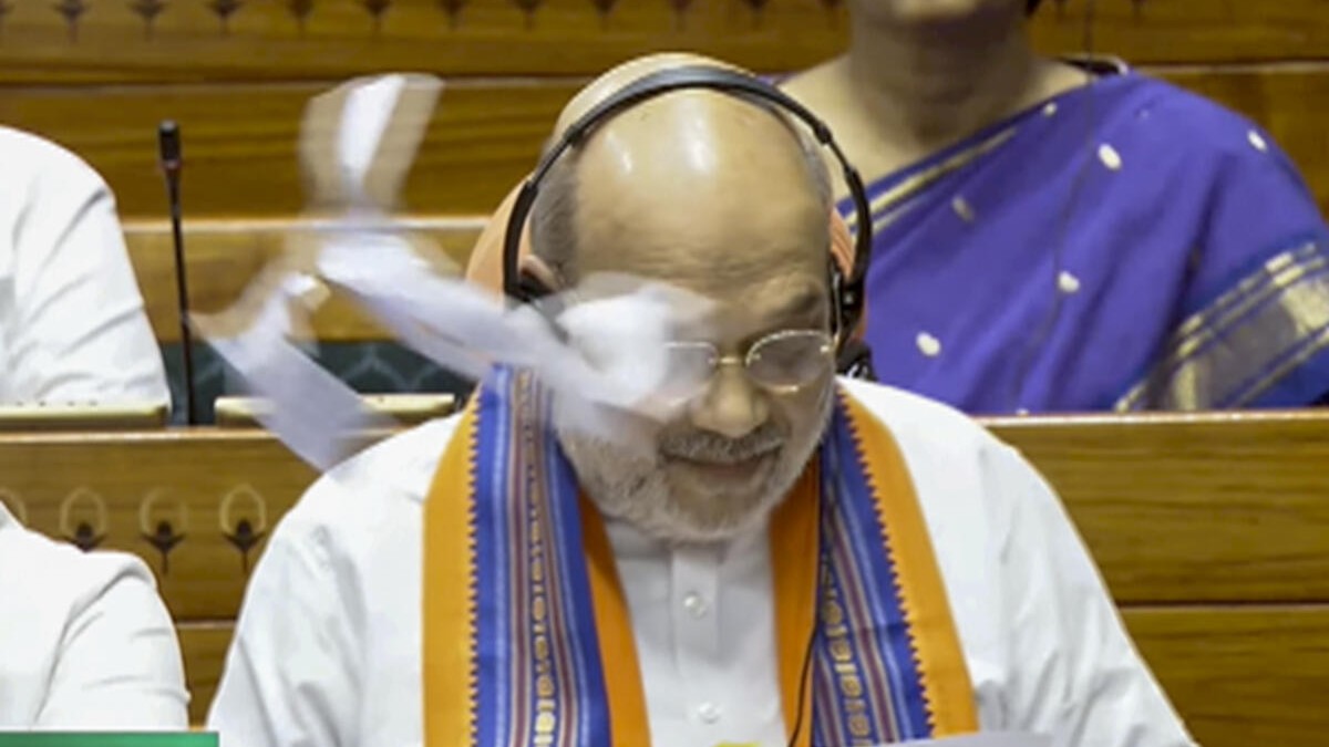 Papers torn, thrown into Well as Amit Shah introduces key bills in Lok Sabha