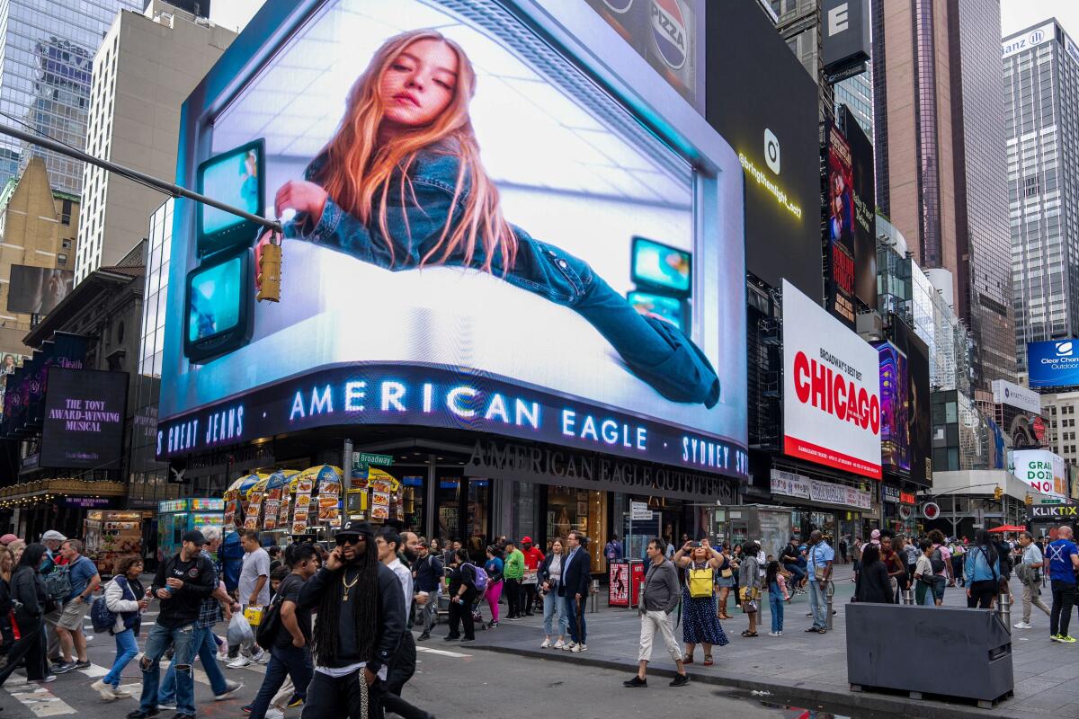 An electronic billboard displays an American Eagle ad campaign featuring Sydney Sweeney, in New York City, U.S., August 21, 2025