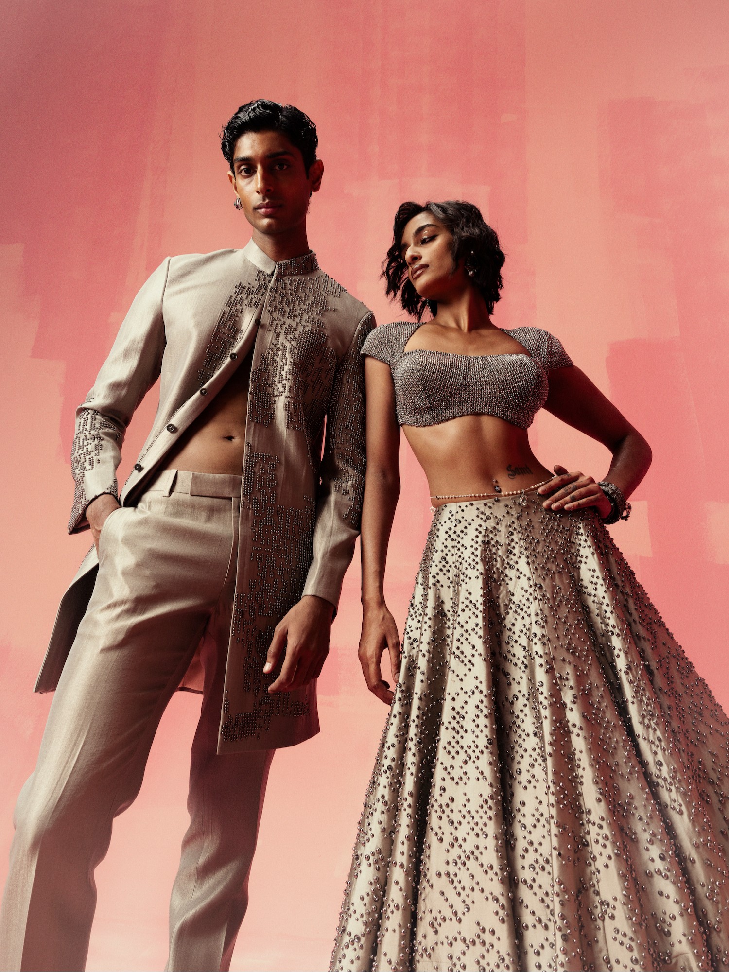 The Last Romantics Rivet Drop by Qbik celebrates festive dressing with hand-embroidered lehengas, sculpted blouses, saree gowns, and Indo-western pieces in soft summer tones, all accented with bold rivet details ideal for Ganesh Chaturthi and beyond.