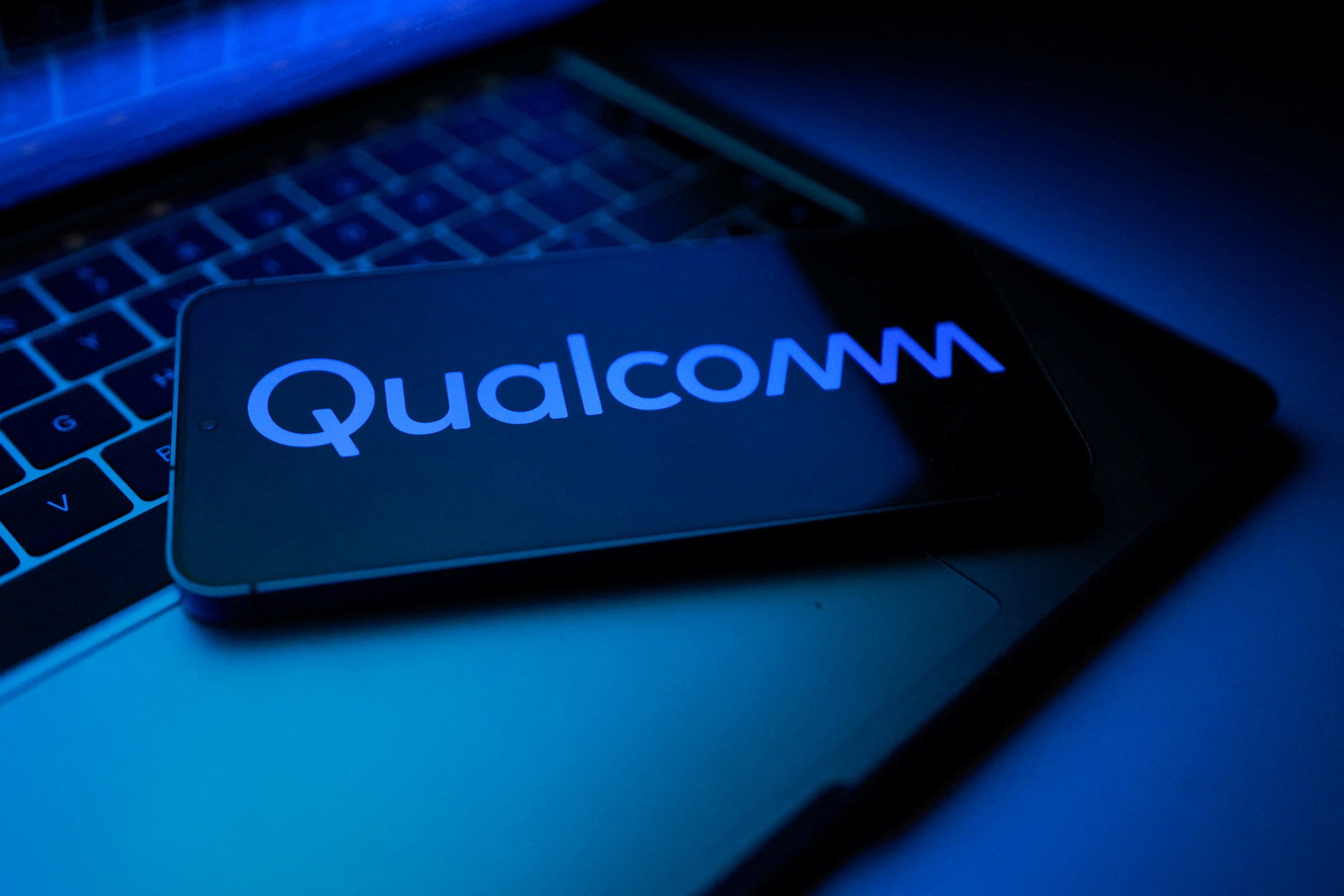 A Qualcomm logo appears in this illustration.
