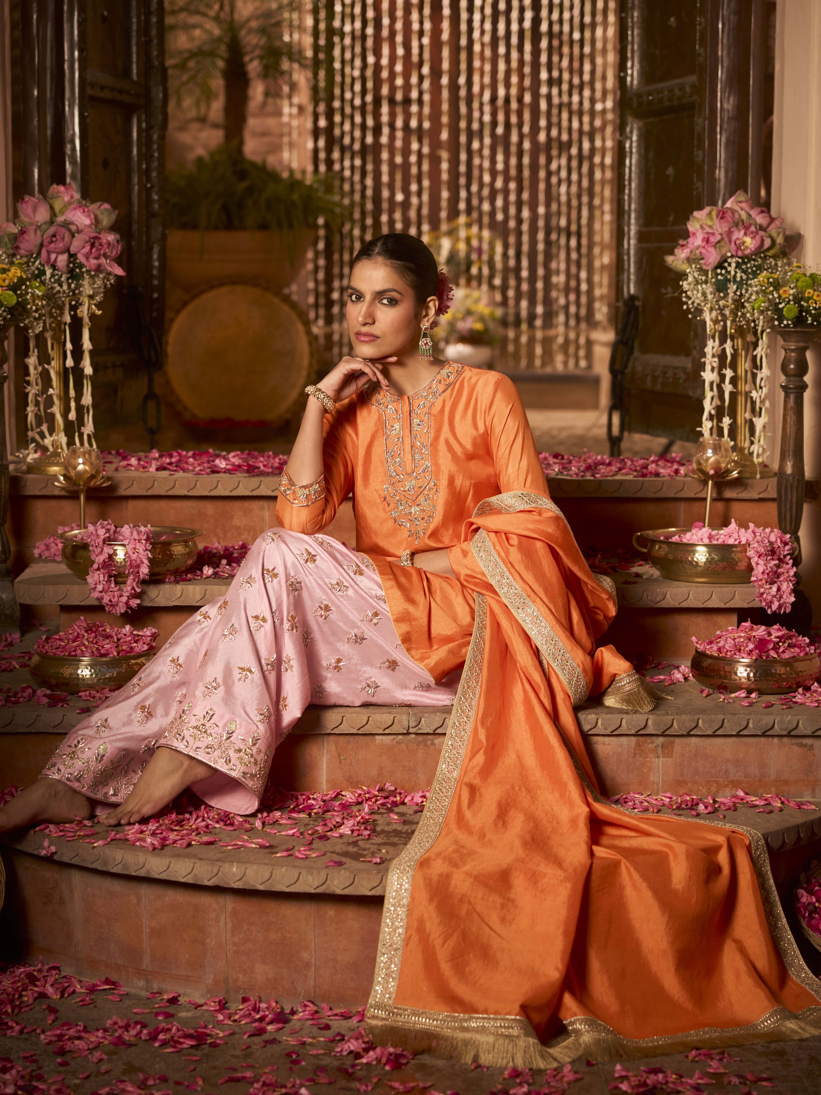 Inspired by the vivid colors of gulal and Manipur’s rich heritage, 11 Tareng’s collection showcases exquisite Khurkhul silk garments with detailed Meitei motifs. From lehengas to draped skirts and ornate dupattas, these festive pieces capture tradition and joy, ideal for Ganesh Chaturthi.