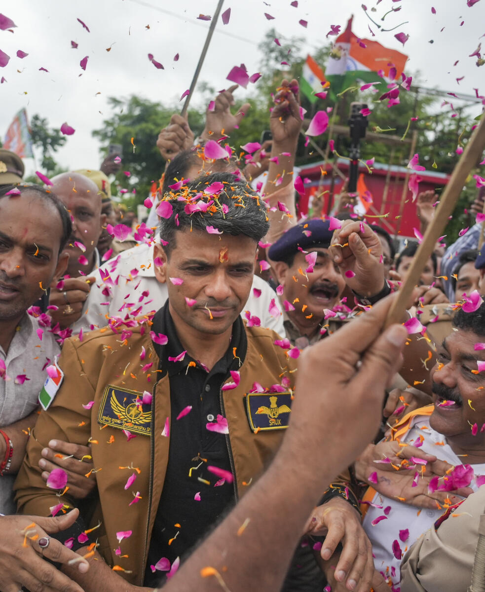 Group Captain Shubhanshu Shukla during a victory parade as he is welcomed after his mission to the International Space Station (ISS), in Lucknow, Monday, Aug. 25, 2025.