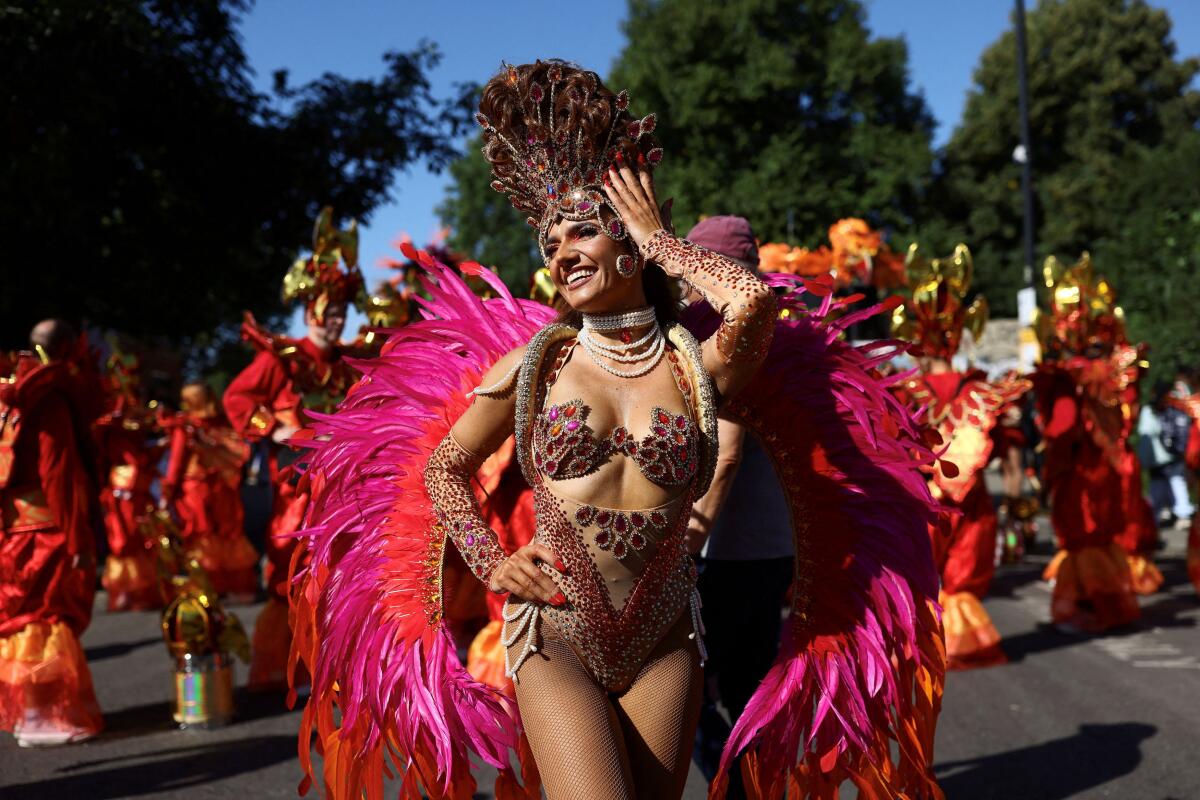 A reveller takes part in the Notting Hill Carnival in London, Britain, August 25, 2025.