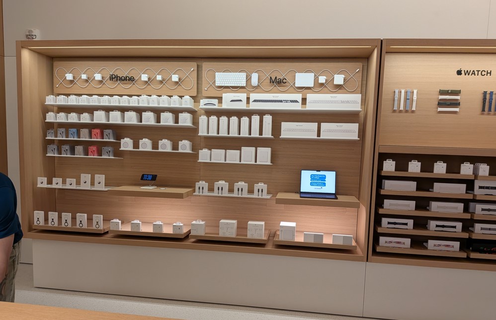Apple iPhone, Mac amd Watch accessories displayed at Apple Hebbal Store.