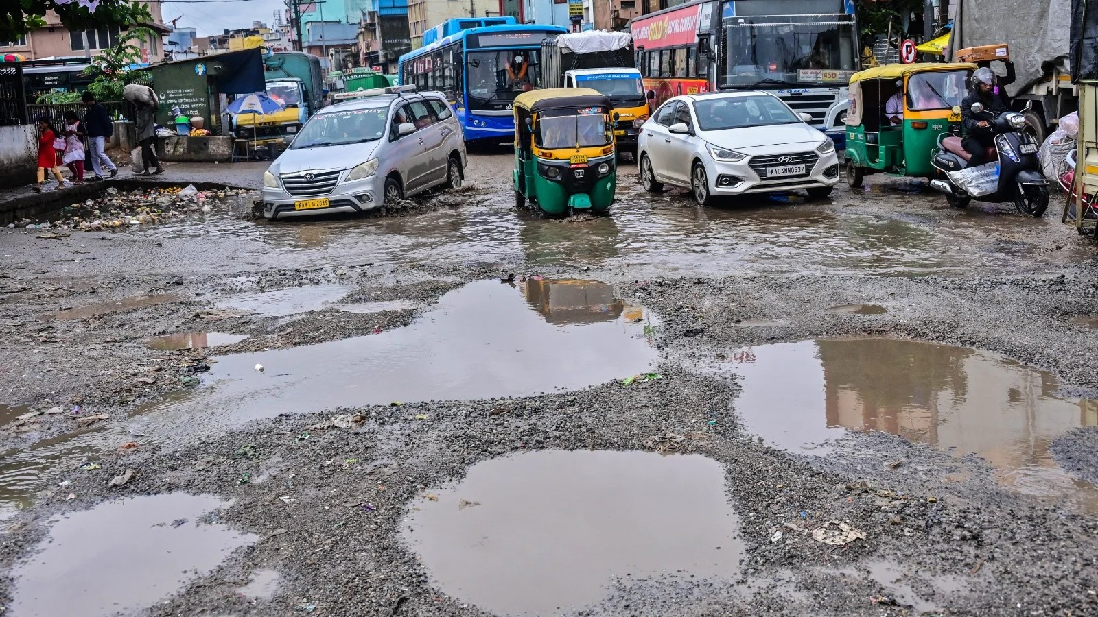 Bengaluru Roads: Rain-Soaked Potholes Paralyse City Traffic