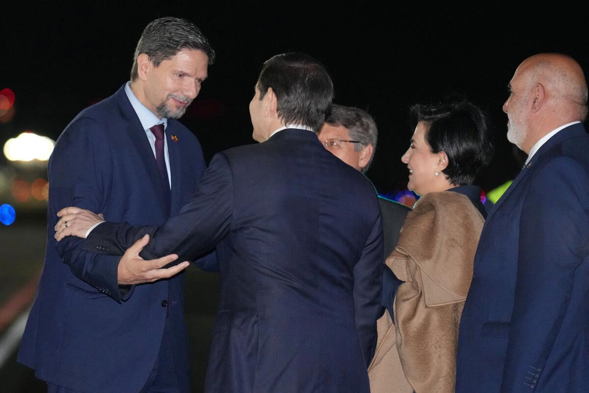 Secretary of State Marco Rubio greets U.S. Ambassador to Ecuador Pablo Zambrano as he arrives in Quito, Ecuador, Wednesday, Sept. 3, 2025, after visiting Mexico City.
