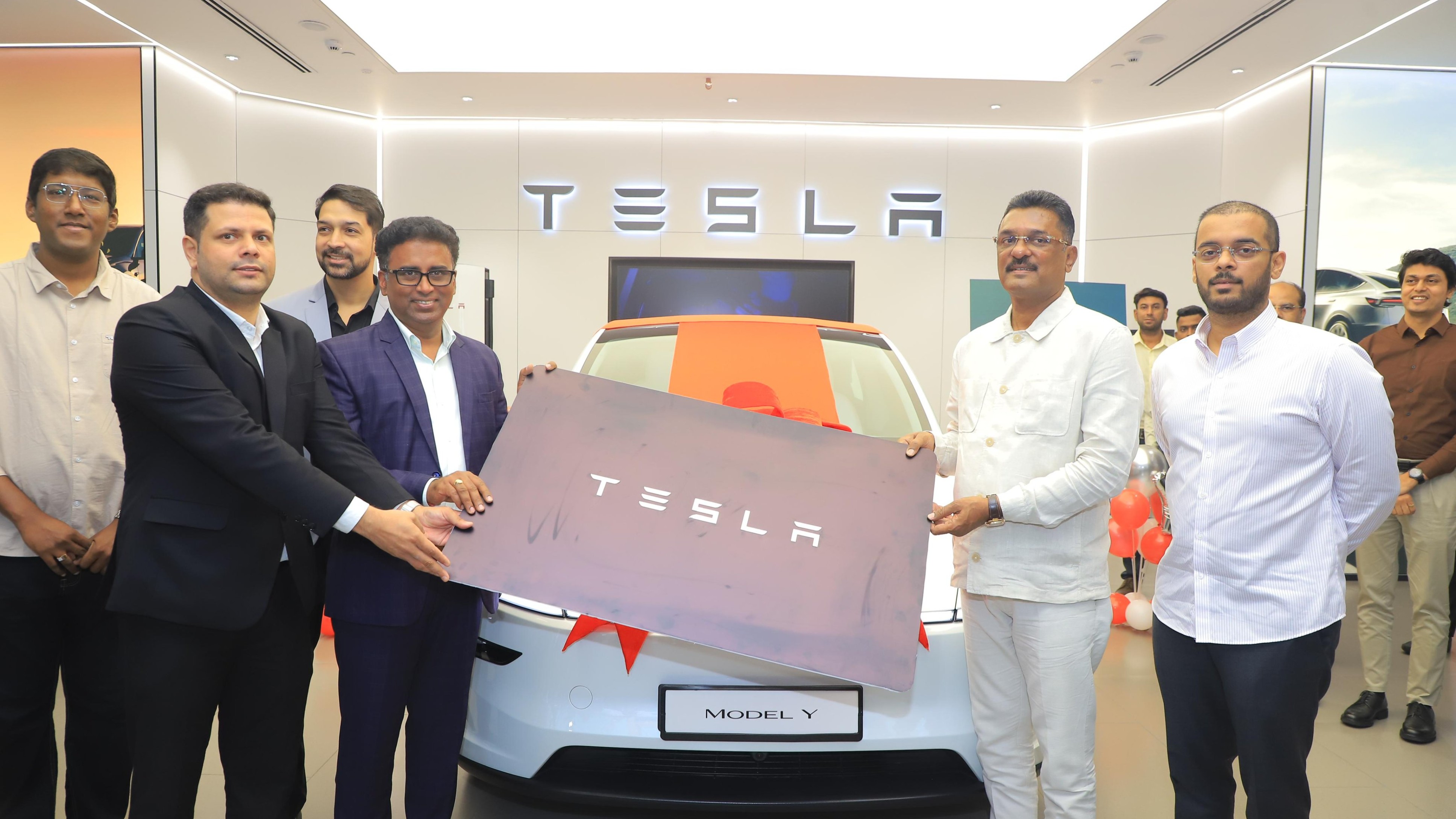 Maharashtra’s transport minister Pratap Sarnaik takes delivery of first Tesla