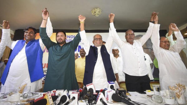 INDIA bloc’s vice presidential candidate B Sudarshan Reddy, center, RJD leader Tejashwi Yadav, second left, Bihar Congress President Rajesh Ram, second right, and others during a press conference, in Patna.