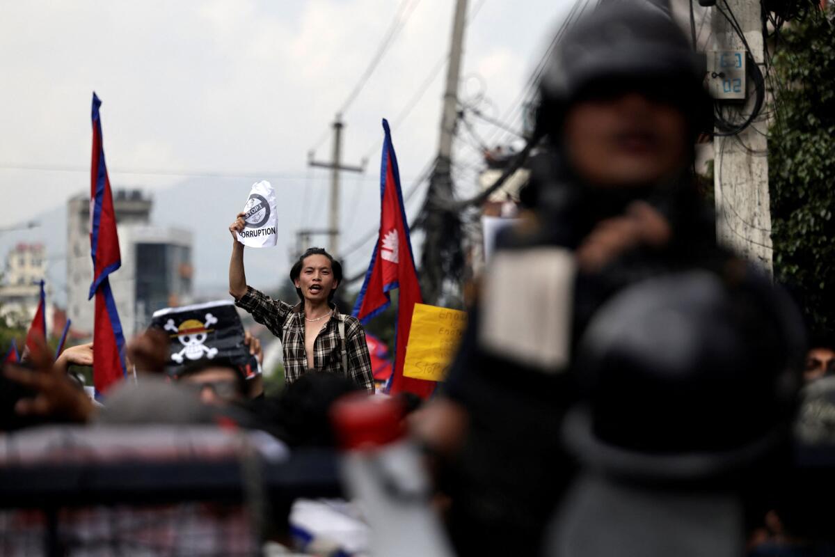 A demonstrator shouts slogans during a protest against corruption and the government’s decision to block several social media platforms, in Kathmandu, Nepal September 8, 2025.