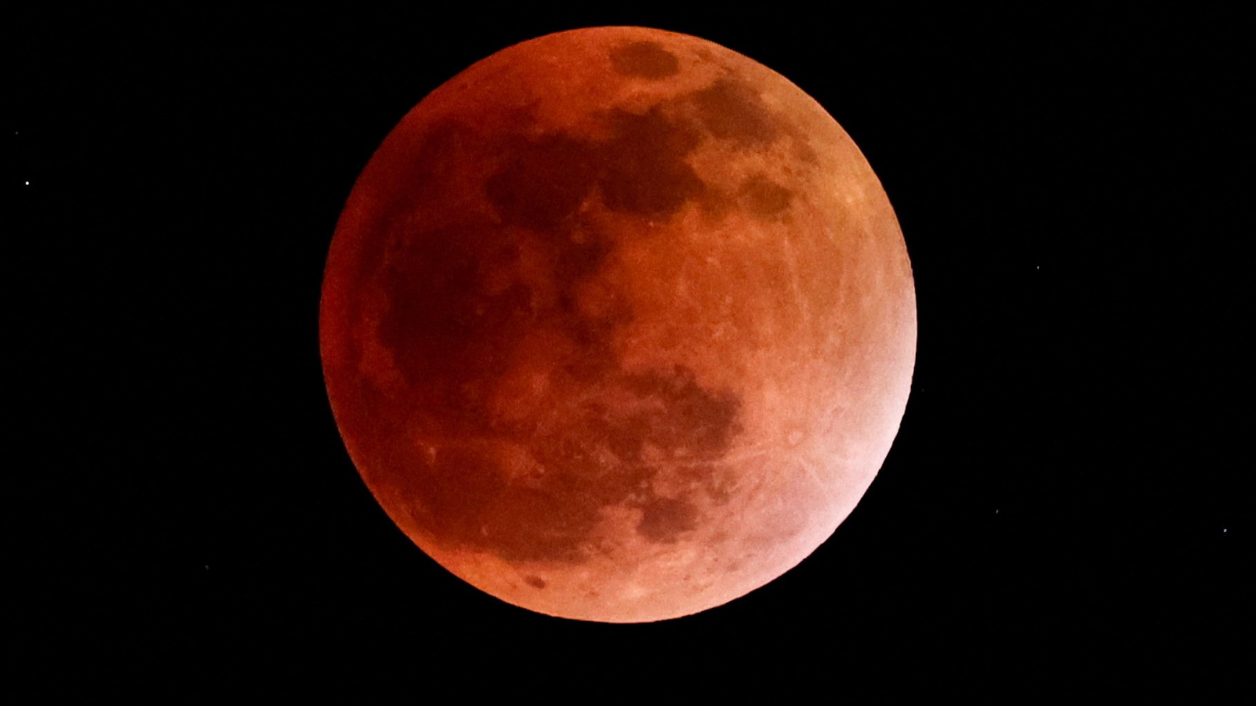Full moon rises in the sky during a 'Blood Moon' total lunar eclipse, as seen from the Sopa Lodge in the Samburu National Reserve in Northern Kenya, in Samburu, Kenya.