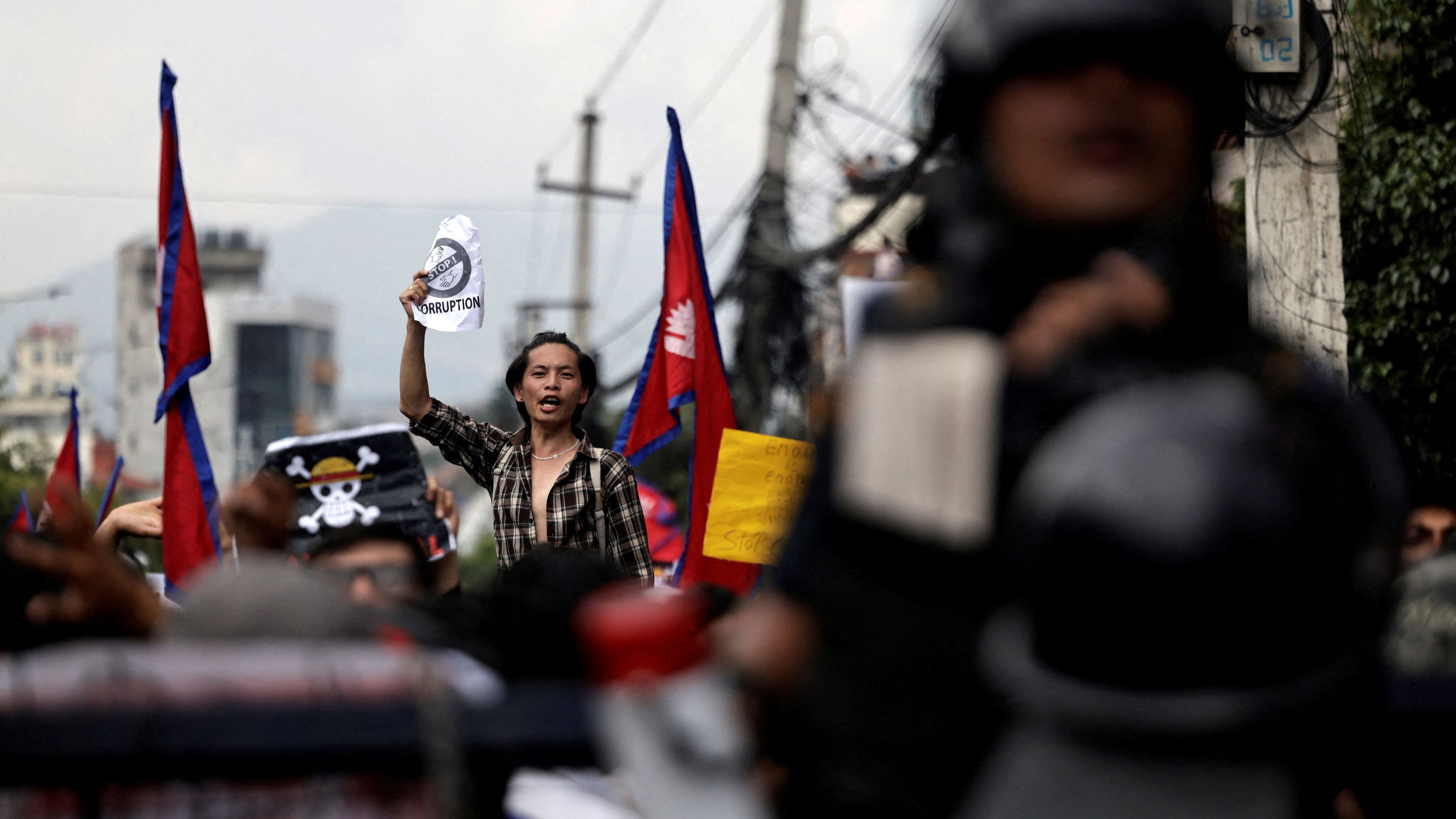 A demonstrator shouts slogans during a protest against corruption and the government’s decision to block several social media platforms in Kathmandu, Nepal.