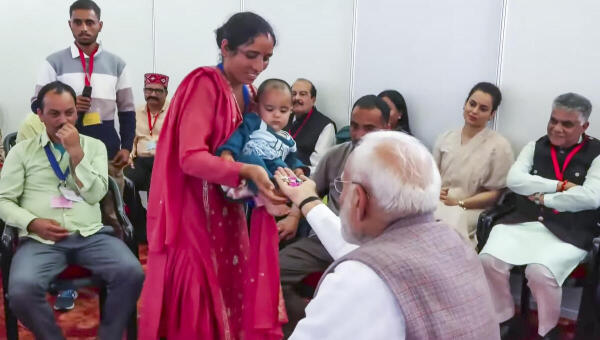 PM Modi meets baby orphaned by cloudburst in Himachal's Kangra, cradles infant in touching gesture