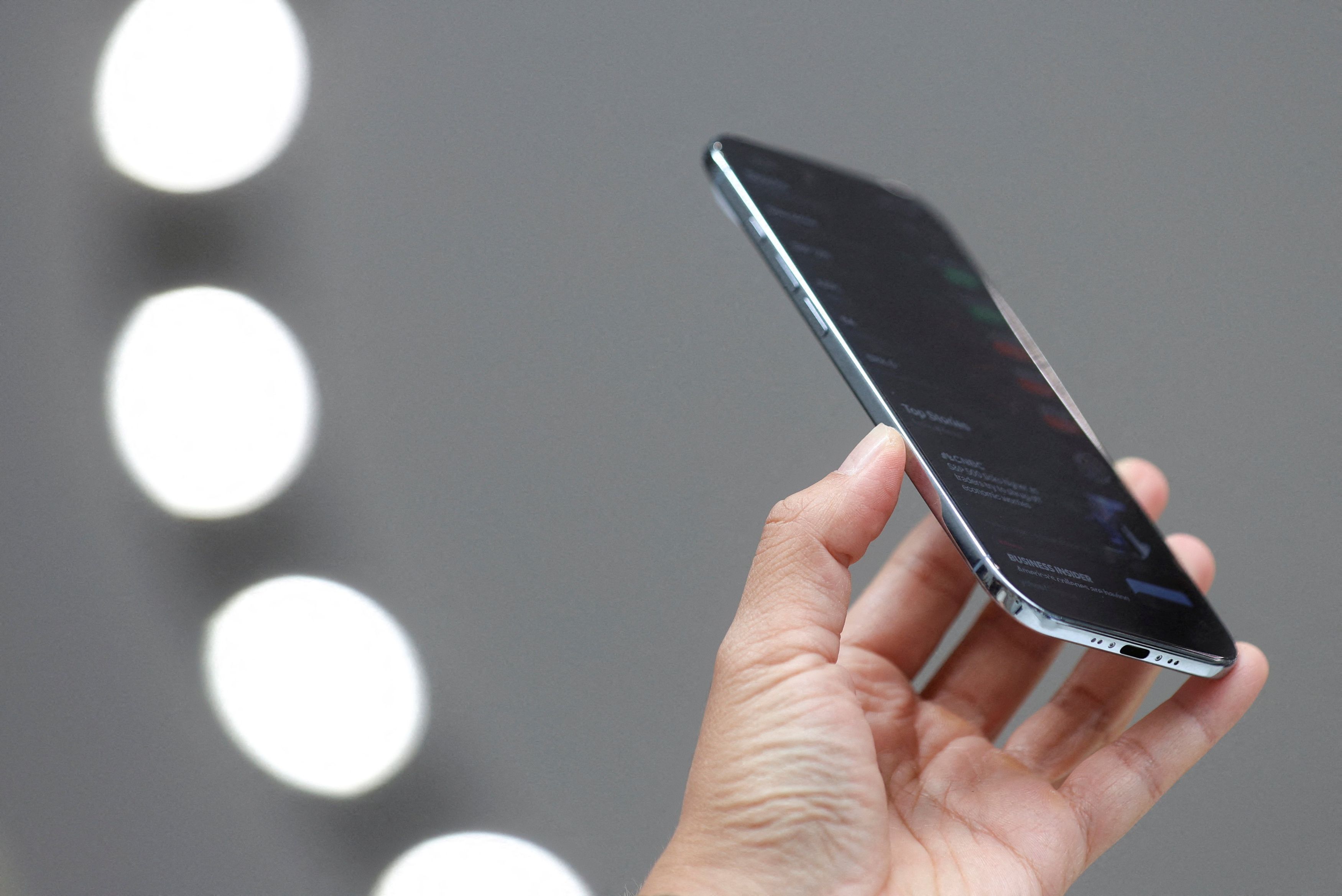A person holds an iPhone Air during Apple's event at the Steve Jobs Theater on its campus in Cupertino, California, US. September 9, 2025. 