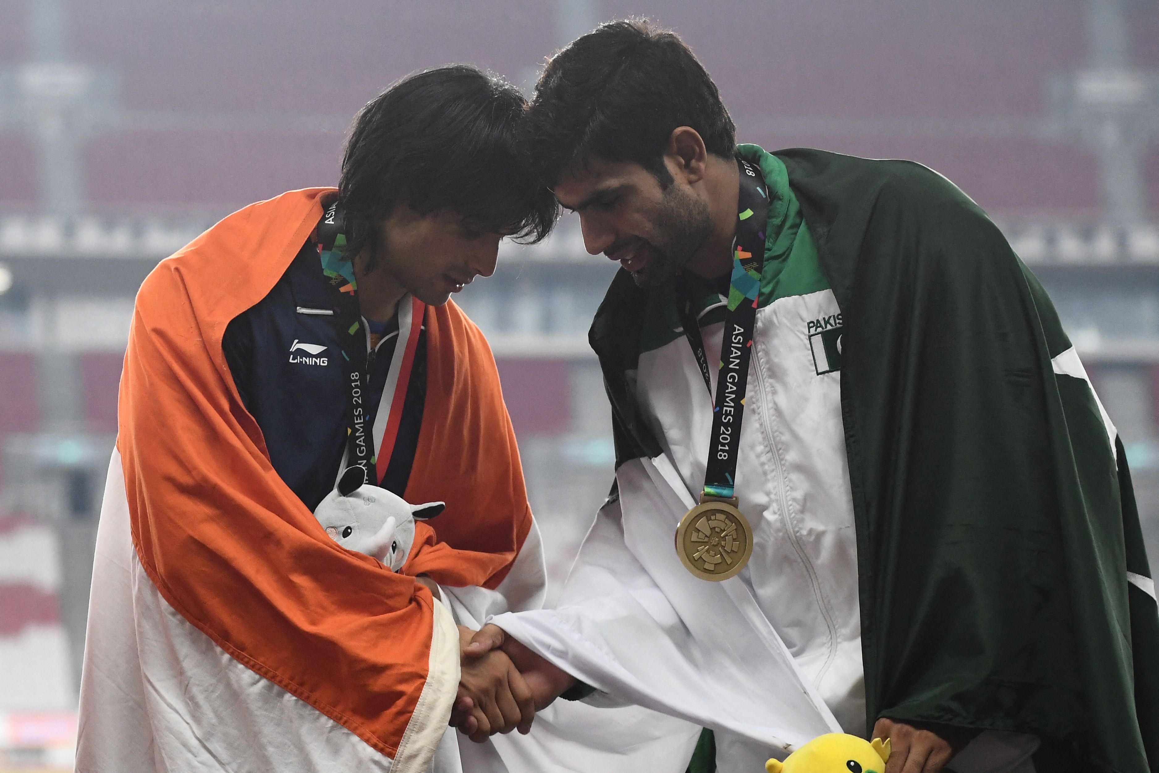 Neeraj Chopra (left) and Arshad Nadeem. AFP