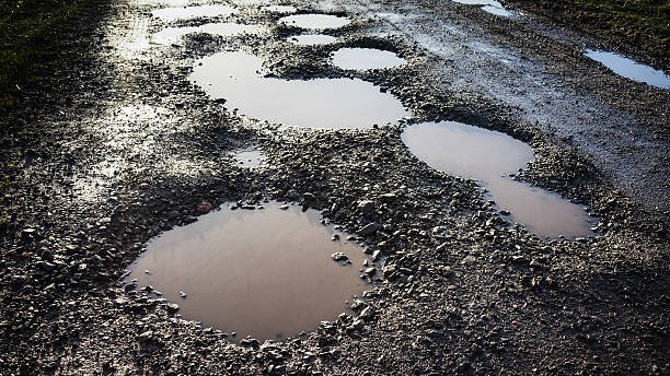 In absence of government help, Jharkhand villagers repair road themselves