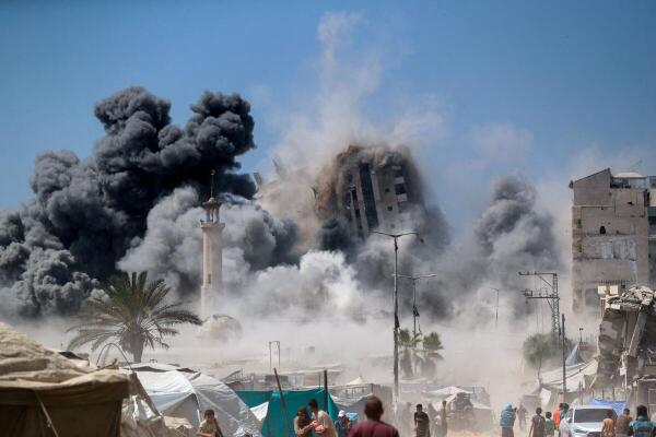 Israeli strike hits the 15-story Mushtaha Tower in Gaza City.