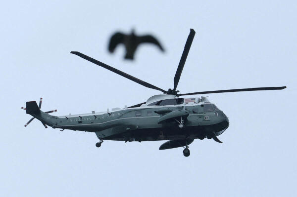 A helicopter believed to be carrying U.S. President Donald Trump departs from Windsor Castle.