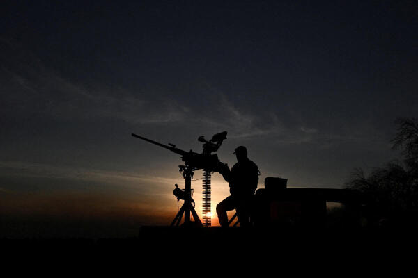 Ukrainian serviceman is seen during a combat shift in a front line in Kharkiv region.