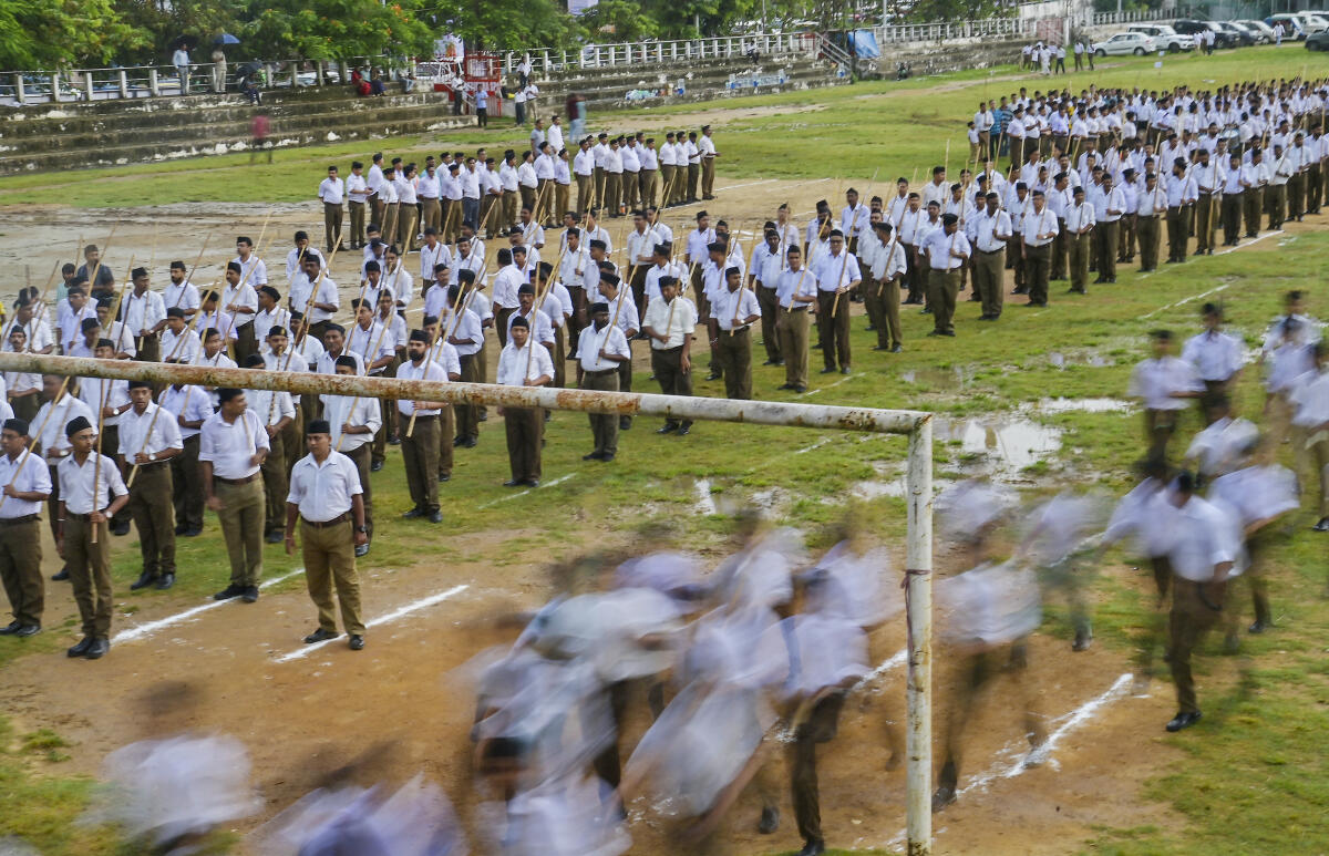 RSS volunteers take part in a rally on the occasion of 'Mahalaya', the last day of 'Pitru Paksha', in Agartala.