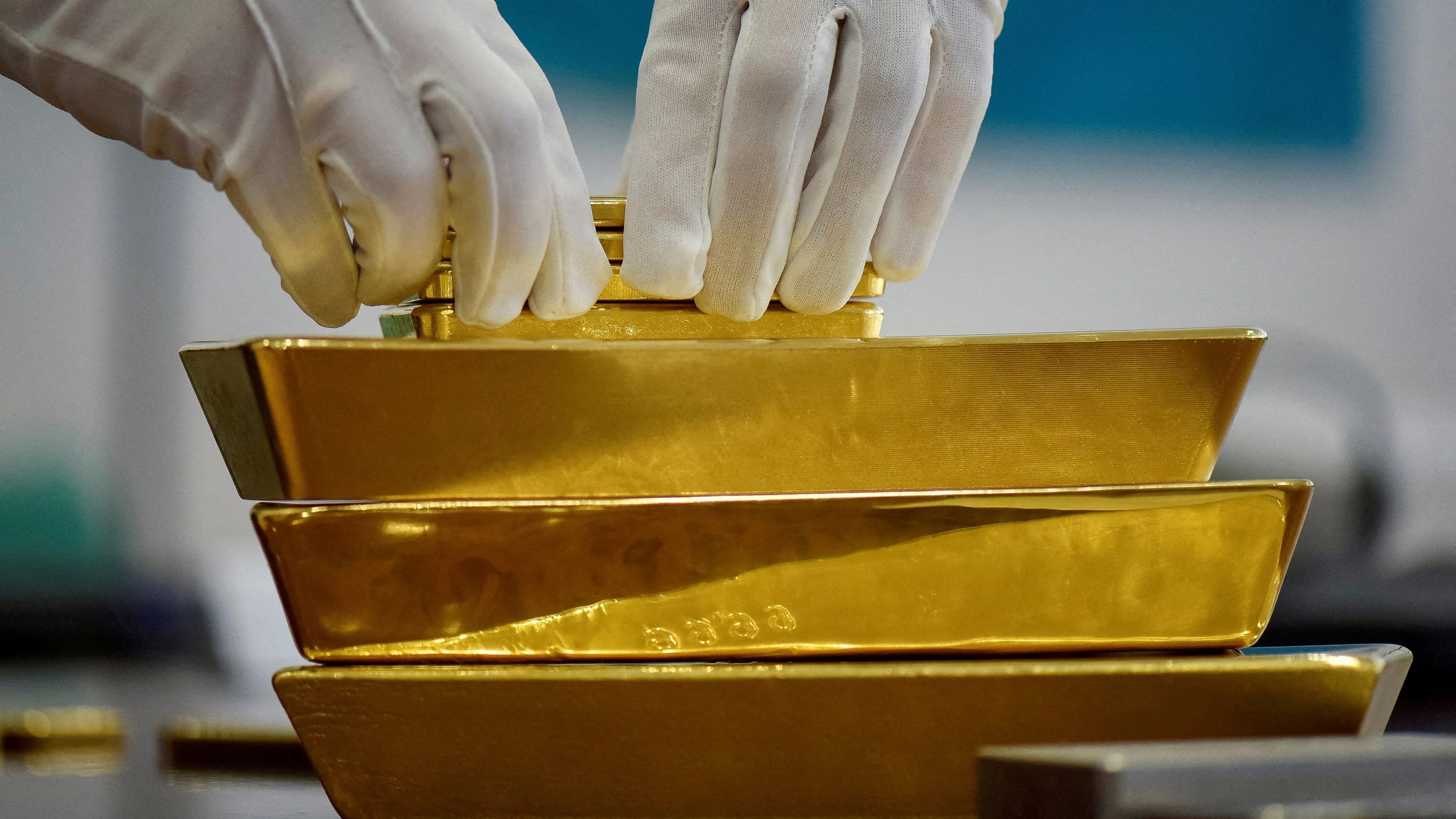 Gold, silver drop from record peak on profit taking, Powell remarks weigh on metals