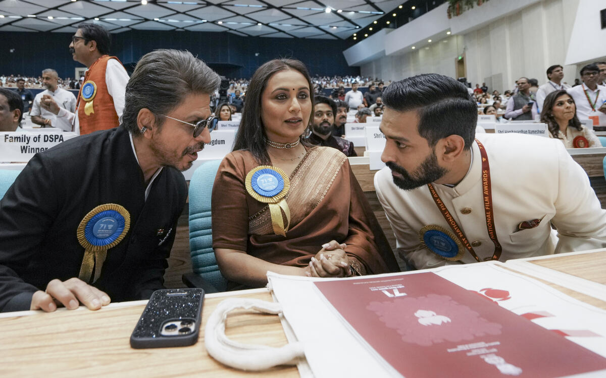 Bollywood actors Shah Rukh Khan, Rani Mukerji, and Vikrant Massey during the 71st National Film Awards ceremony, in New Delhi.