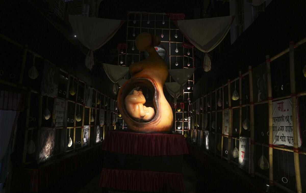 A Durga Puja pandal themed on 'Mother', in Kolkata, Saturday, Sept. 27, 2025.