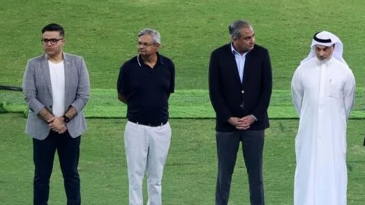  Asian Cricket Council and Pakistan Cricket Board chairman Mohsin Naqvi (second from right) before the trophy presentation.
