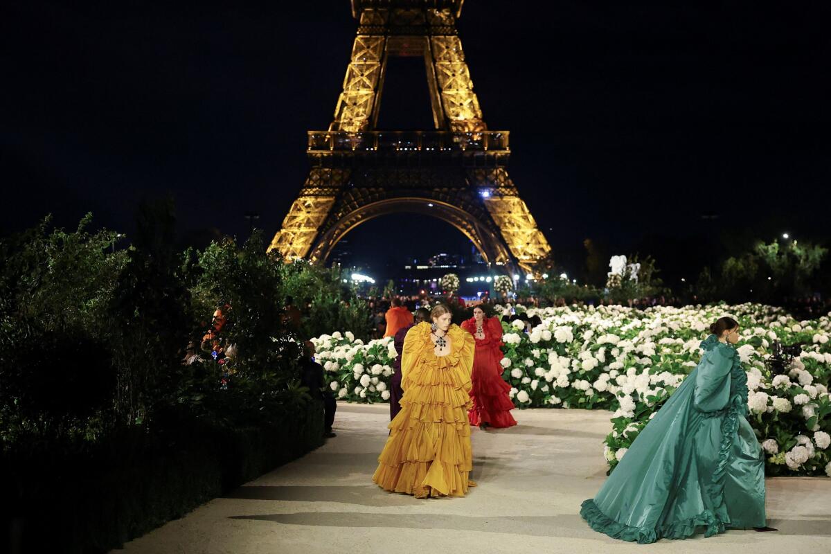 Models present creations by designer Anthony Vaccarello as part of his Spring/Summer 2026 Women's ready-to-wear collection show for the fashion house Yves Saint Laurent during Paris Fashion Week in Paris, France, September 29, 2025.