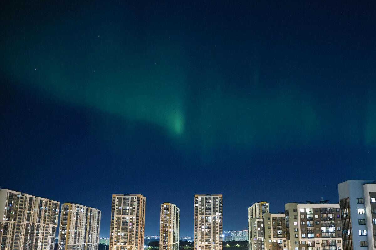 Northern lights, also known as aurora borealis, illuminate the sky in Saint Petersburg, Russia