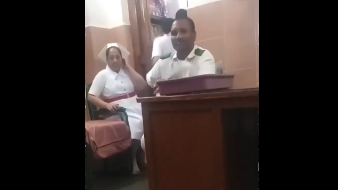 Row after video shows nurses hurling Prabodhankar Thackeray's book at retiring officer who gifted it